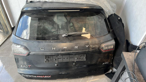 درب صندوق مشکی فابریک تیگو ۸ پرو اصلی با شیشه (استوک سالم)