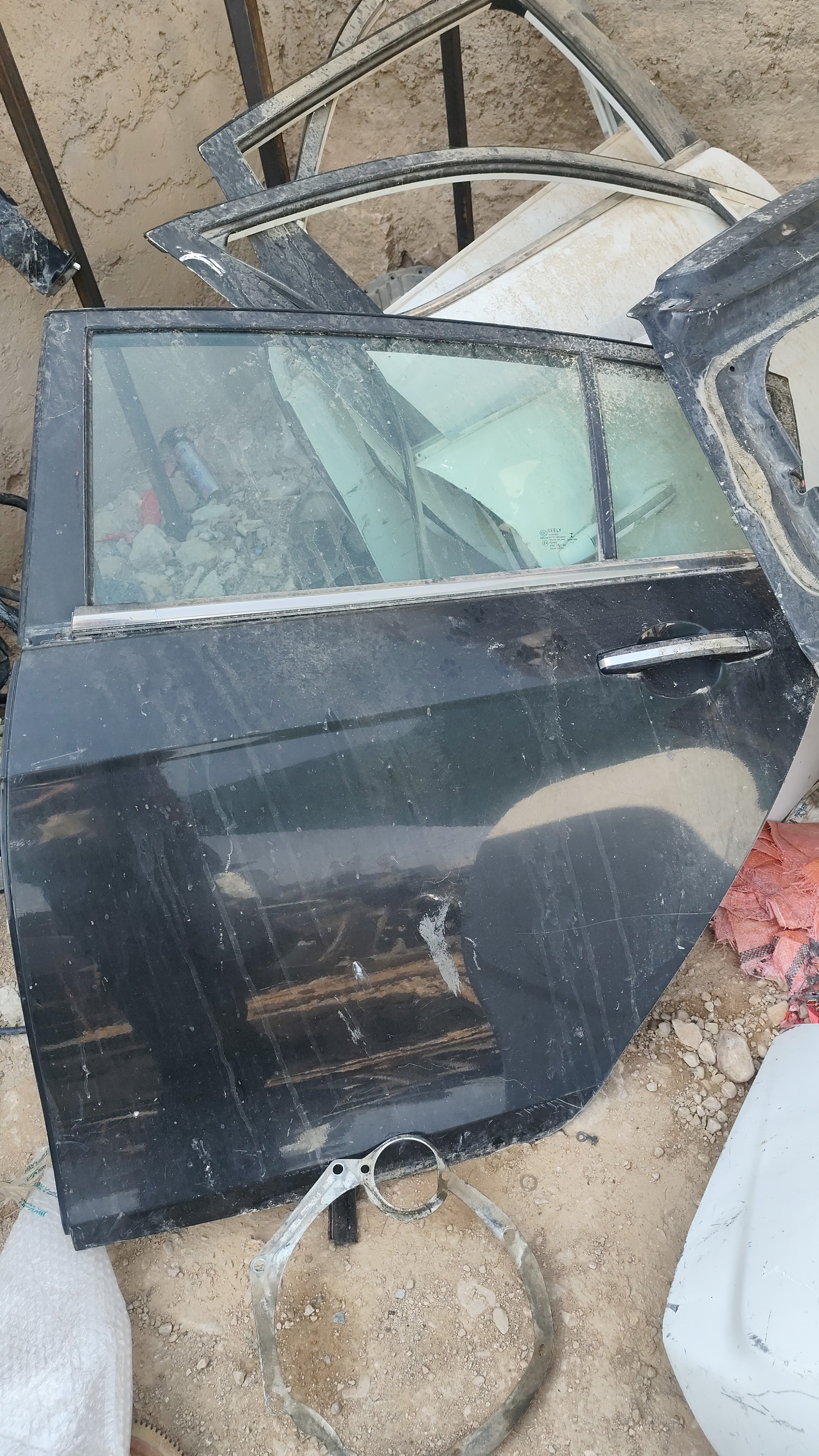 درب عقب چپ جیلی سواری هاج بک مشکی فابریک (استوک -بدون لوازم )